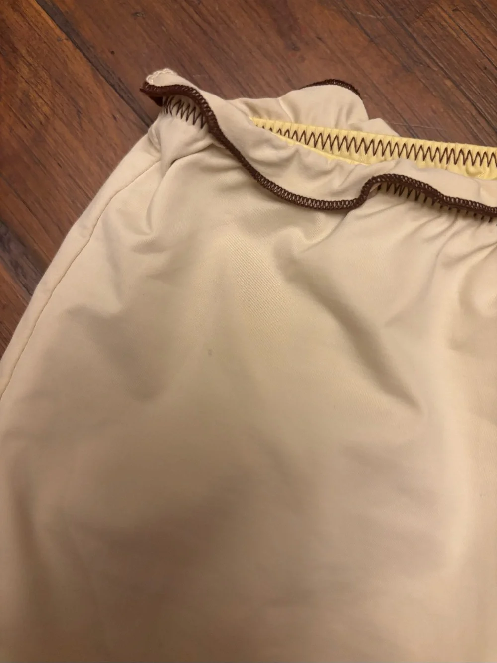 Frankie’s bikinis x Gigi HADID yellow swim shorts with brown trim